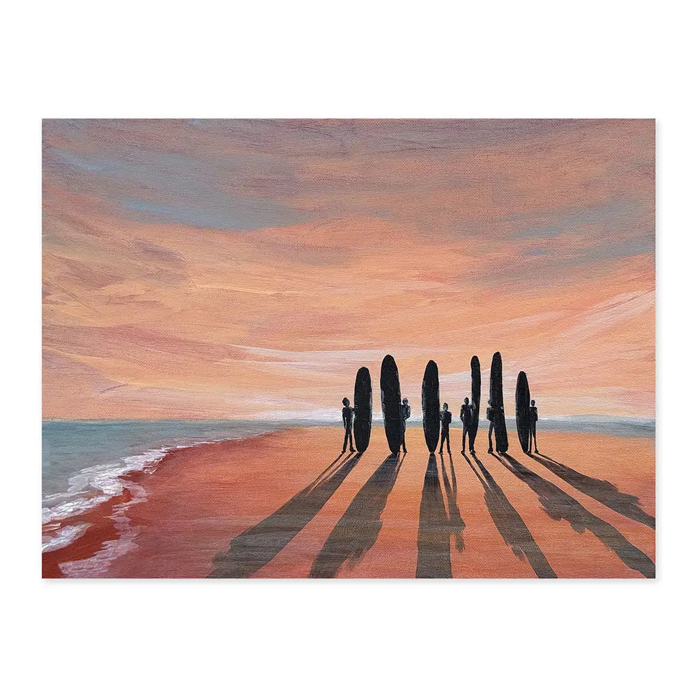 Artistic depiction of surfers with boards on a beach at sunset.