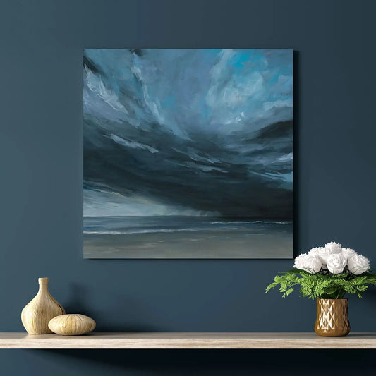 Artistic depiction of a stormy sky over water in moody cool blues