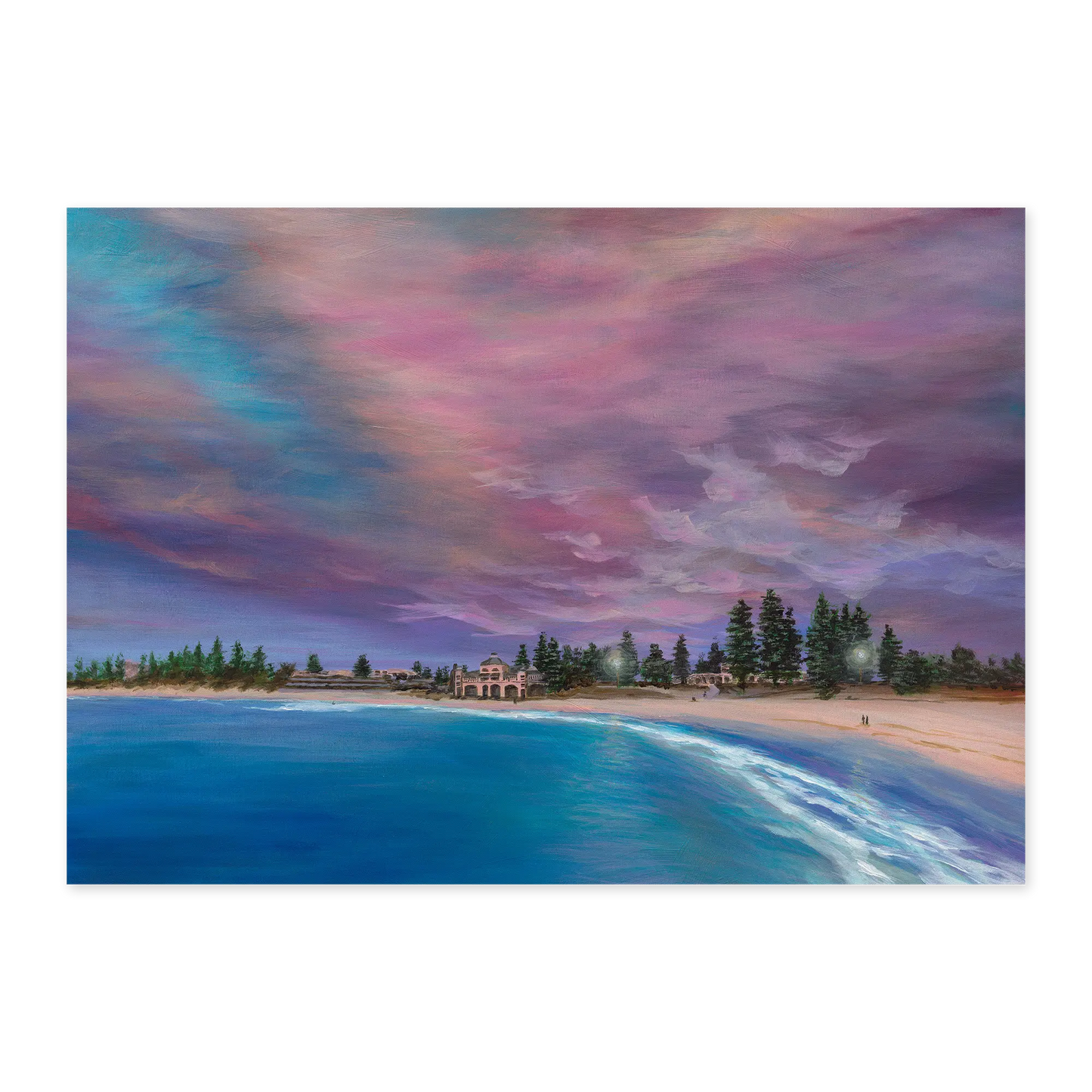 Beach scene with a colorful sky and ocean waves.