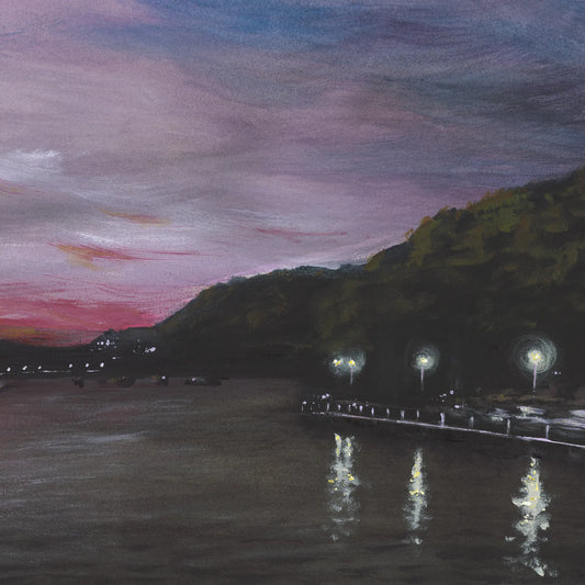 Evening scene with a dock and lights reflecting on water, pink and purple sky