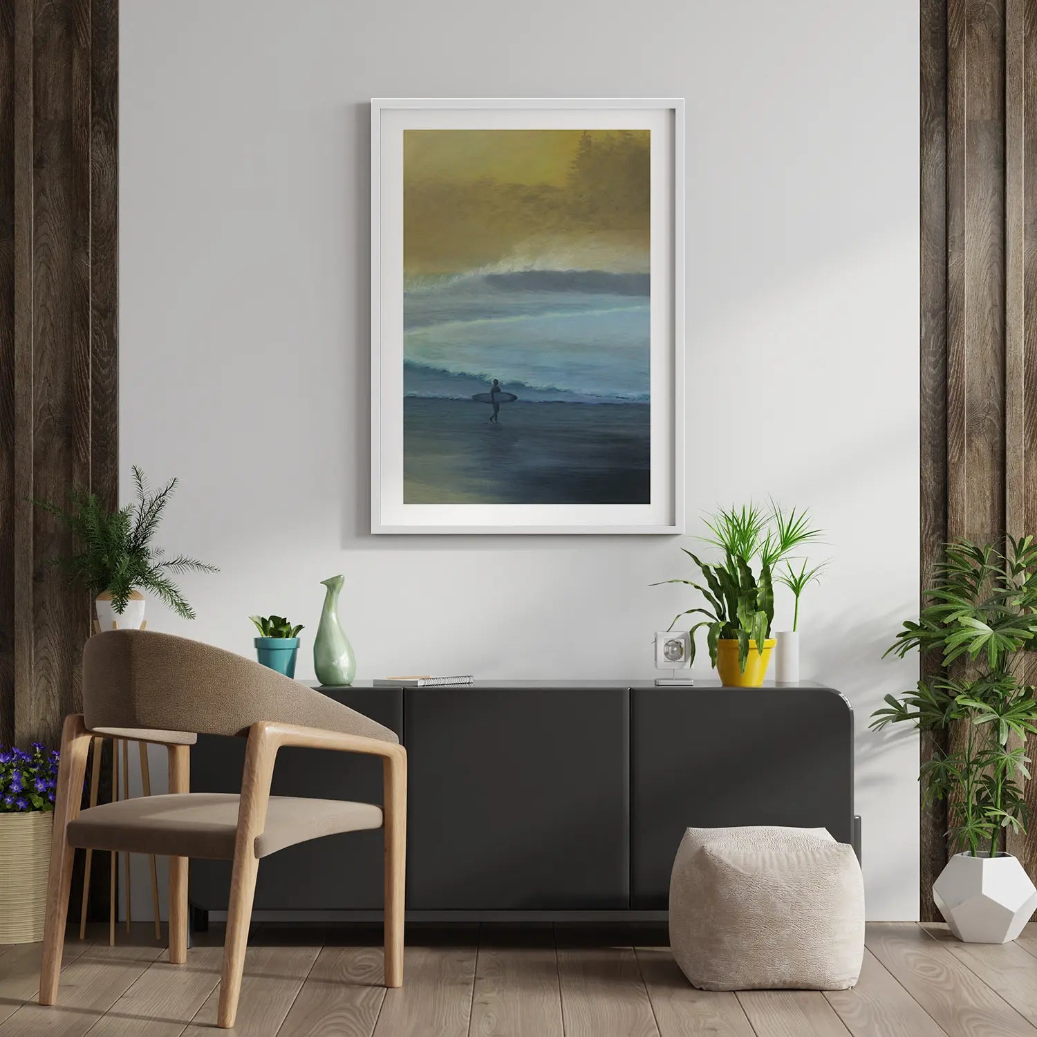 Modern interior with a framed landscape painting, chair, and decorative plants.