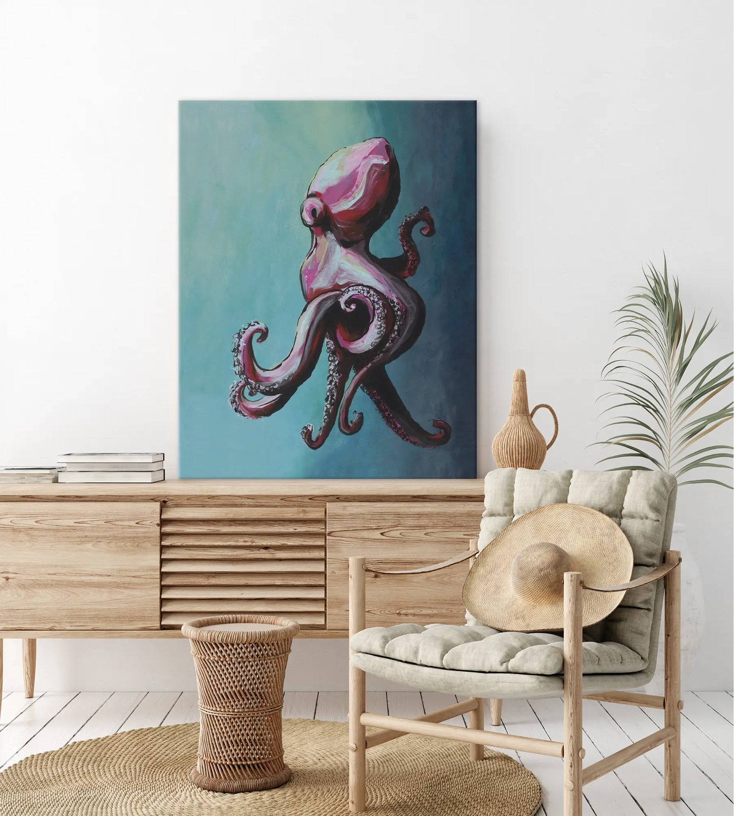 Room interior with a large octopus painting on the wall, wooden cabinet, and chair.